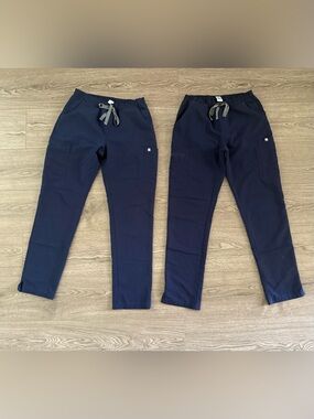 2 pairs of Yola scrub pants. Size small regular length.